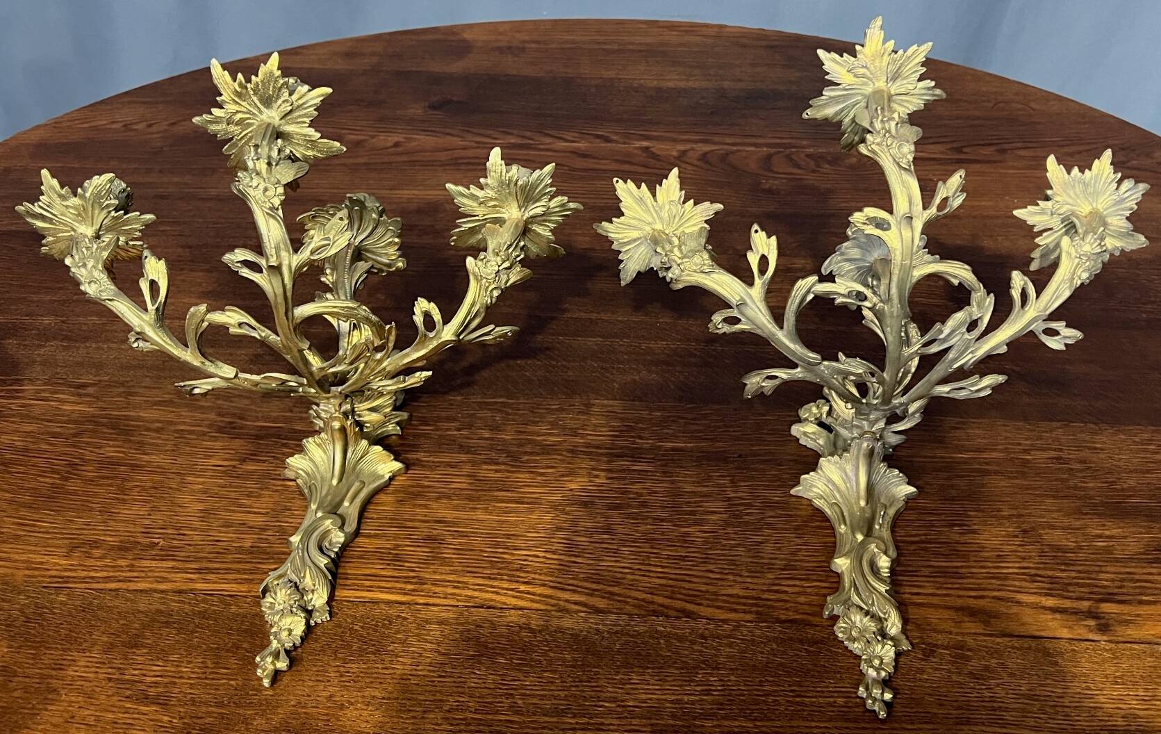 Rococo style wall candle holders. Solid gilded bronze.