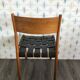 Scandinavian teak chair sitting faux braided leather