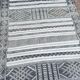 Handwoven Kilim rug made of camel wool, silk, and cactus.
