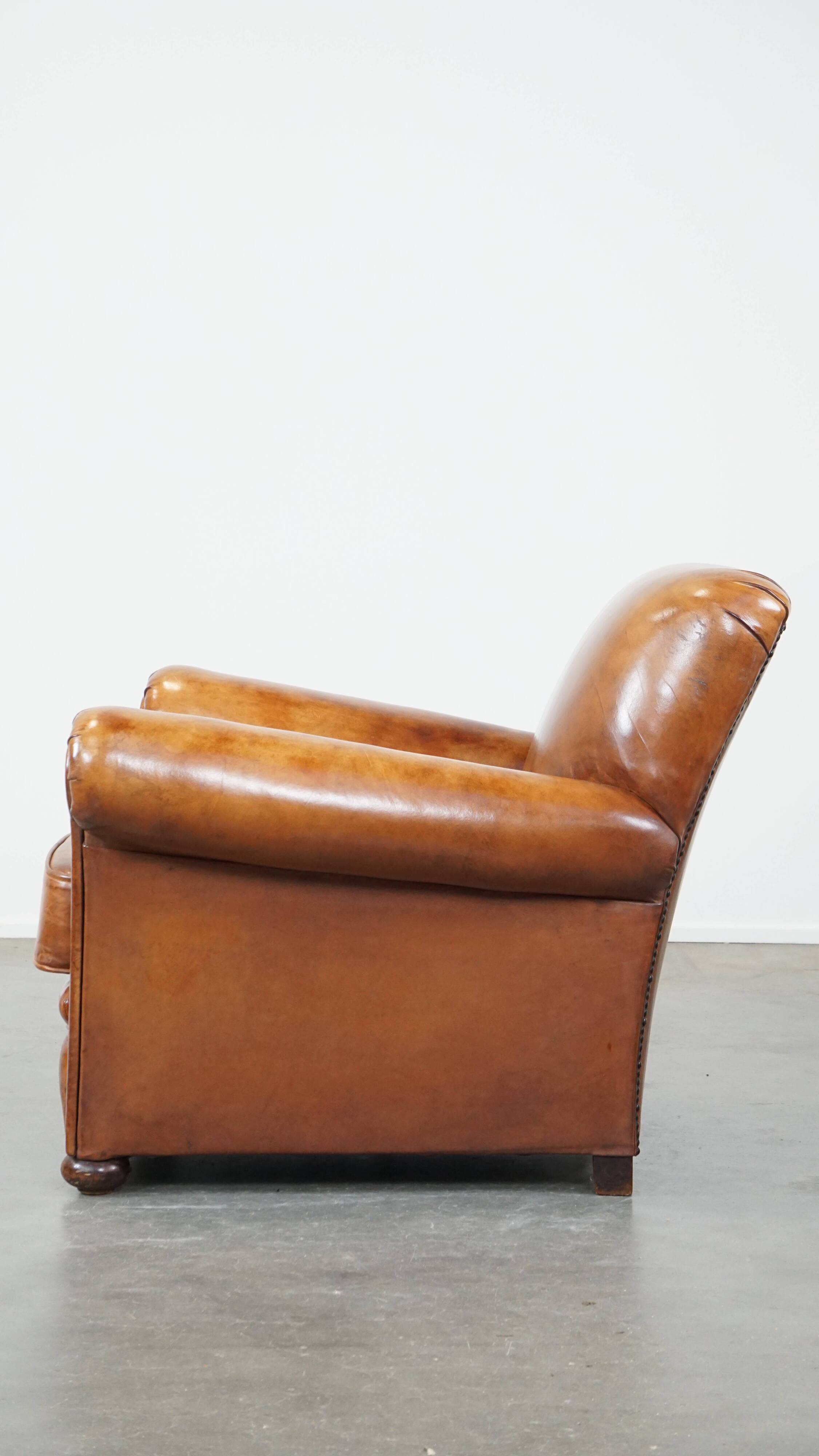 Cognac-colored antique sheep leather armchair