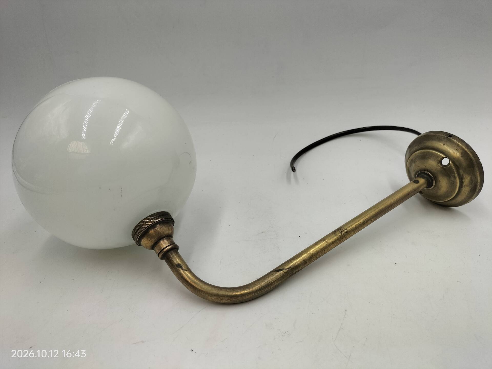 Brass and glass wall light