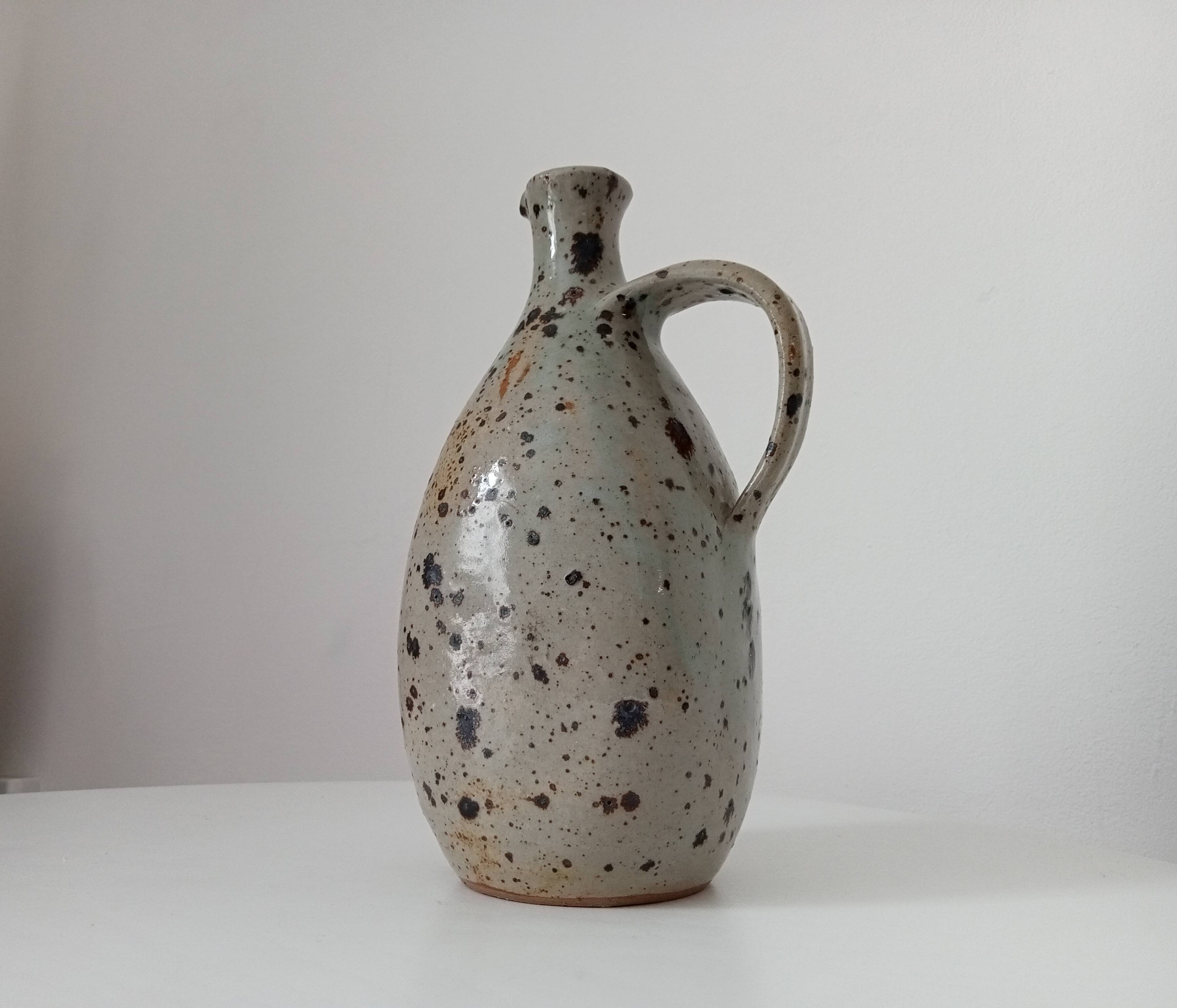 Signed pitcher in vintage speckled stoneware