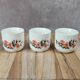 Set of 3 vintage ceramic cups with floral decoration.