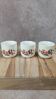Set of 3 vintage ceramic cups with floral decoration.