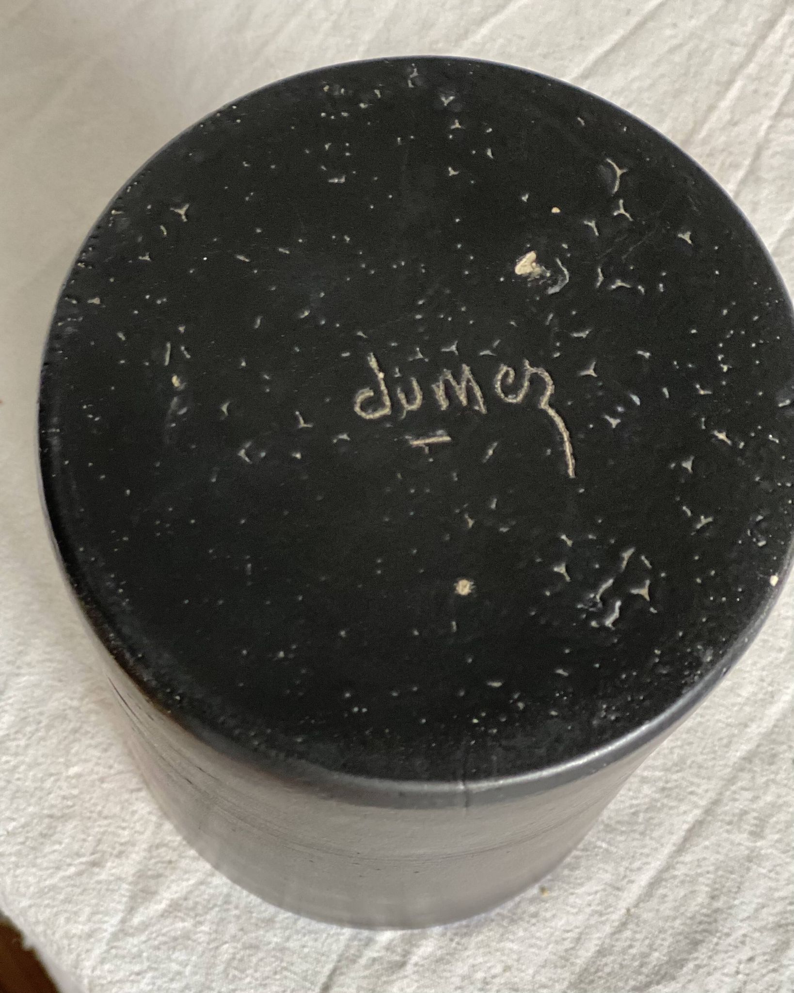 Vintage 1970s black ceramic roll vase signed Dumez.