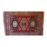 Tapis mural aux motifs orientaux.