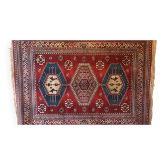 Wall rug with oriental patterns.