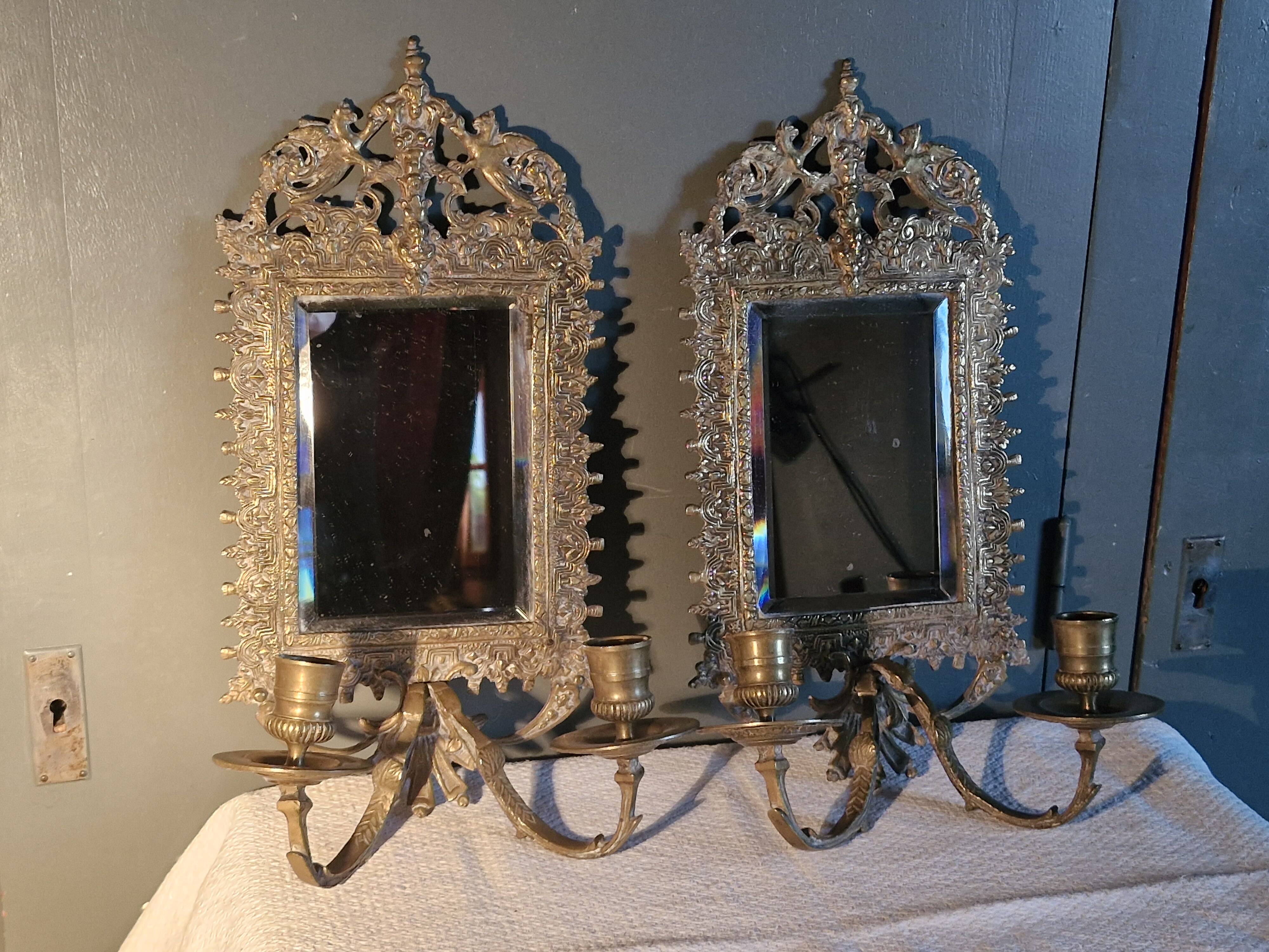 Pair of mirror sconces/candle holders in 19th-century bronze.
