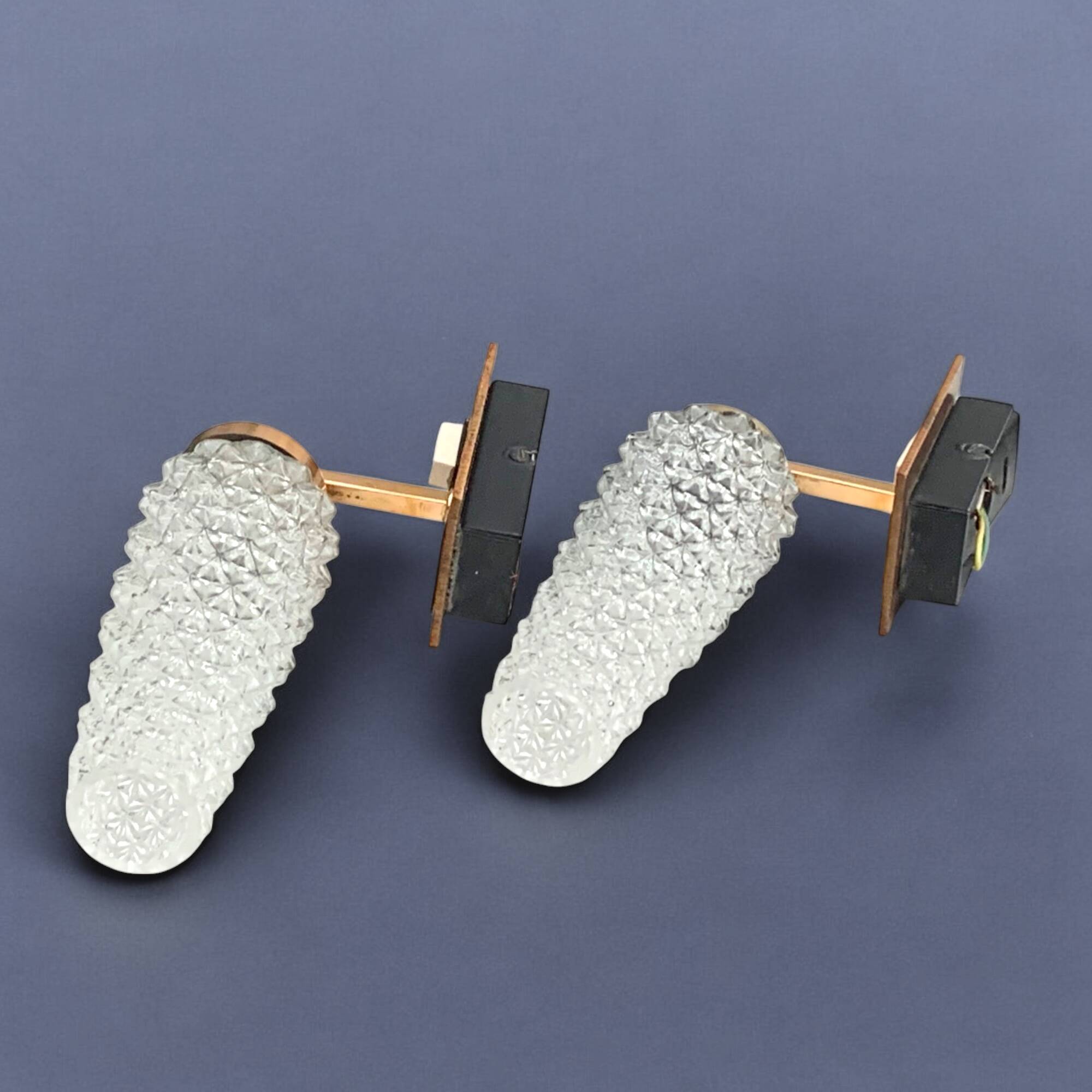 Pair of vintage wall sconces in molded glass and gilded brass