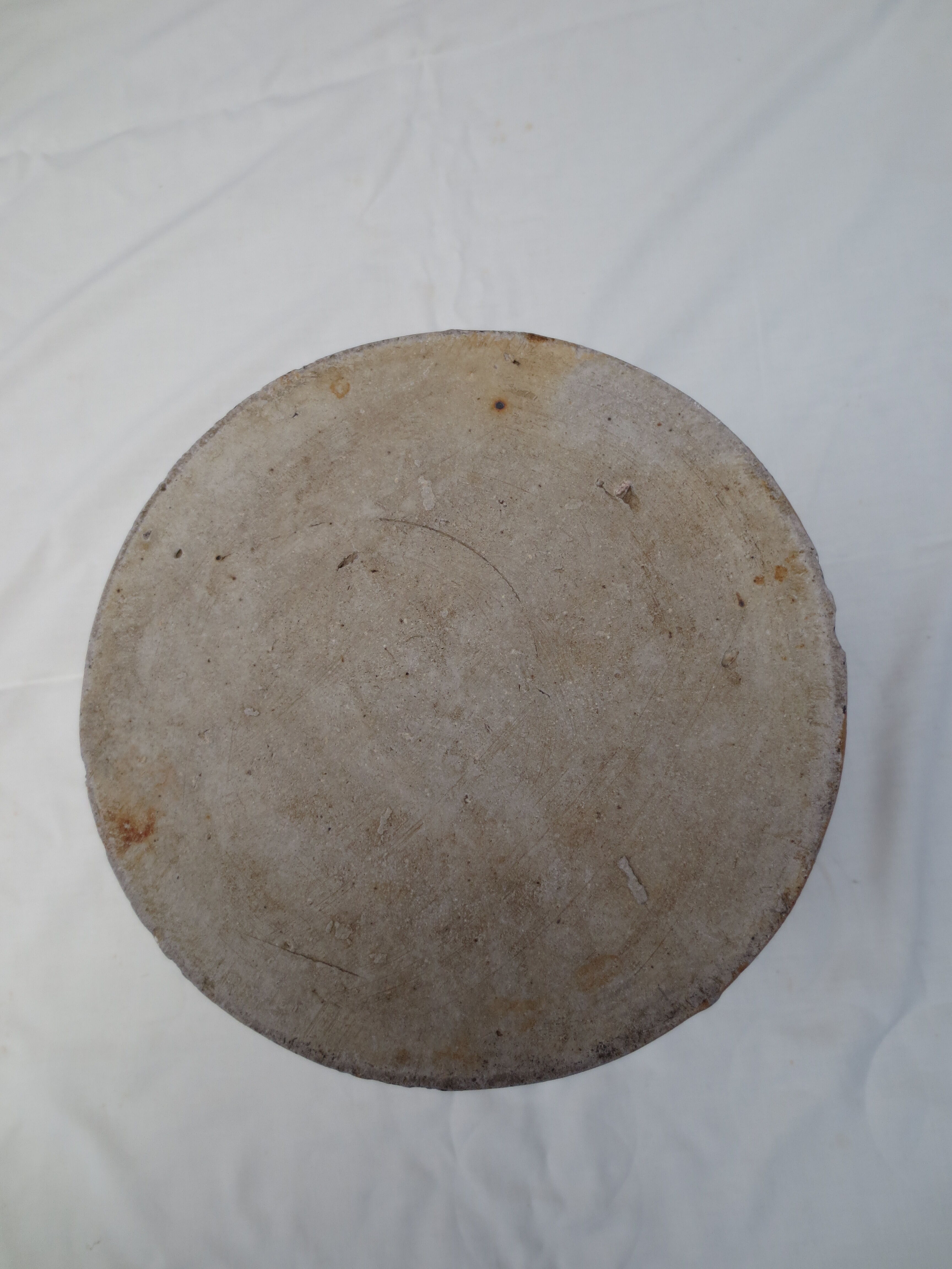 Old butter jug in flaming sandies