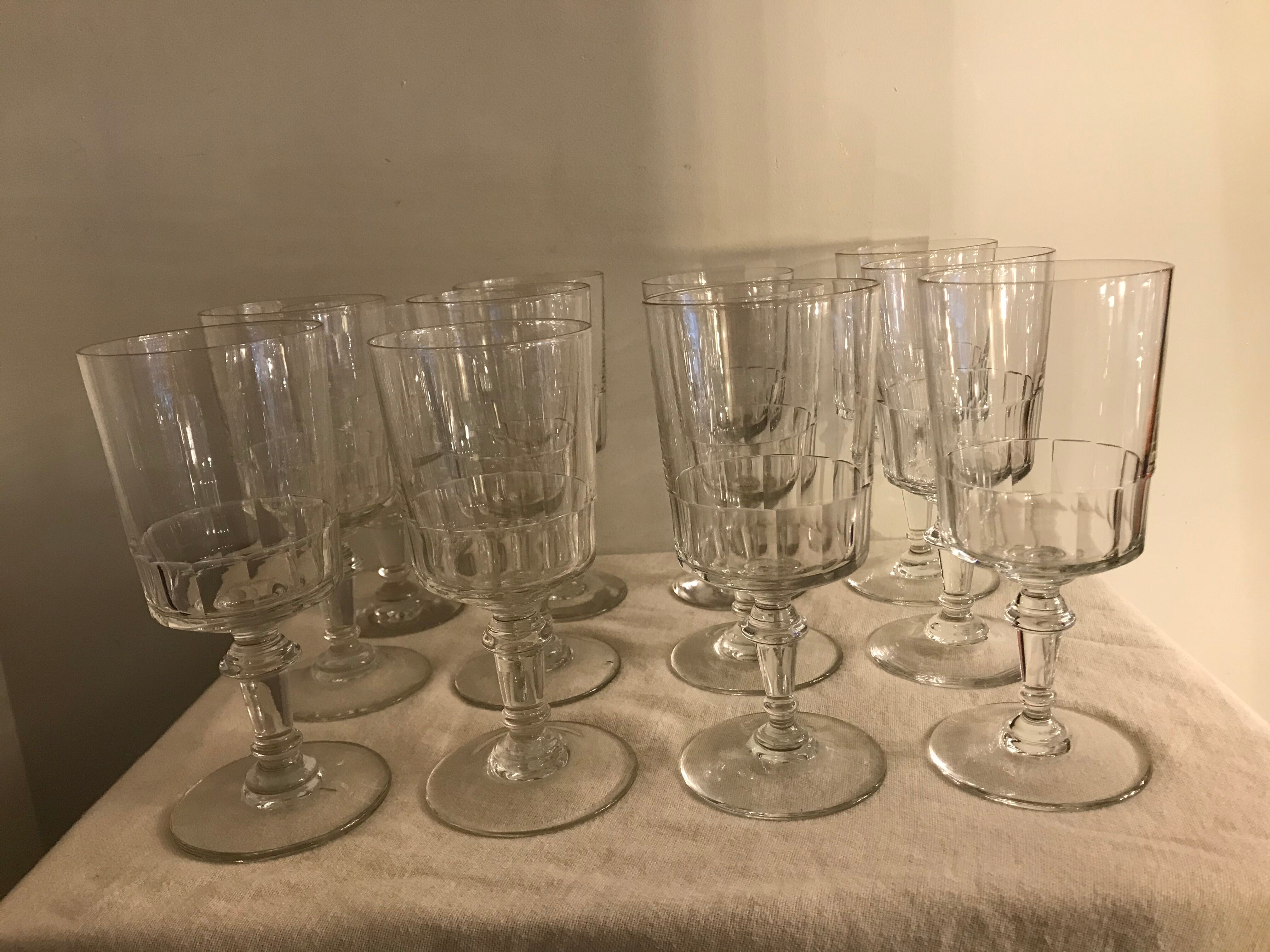 12 old and blown glass walking glasses
