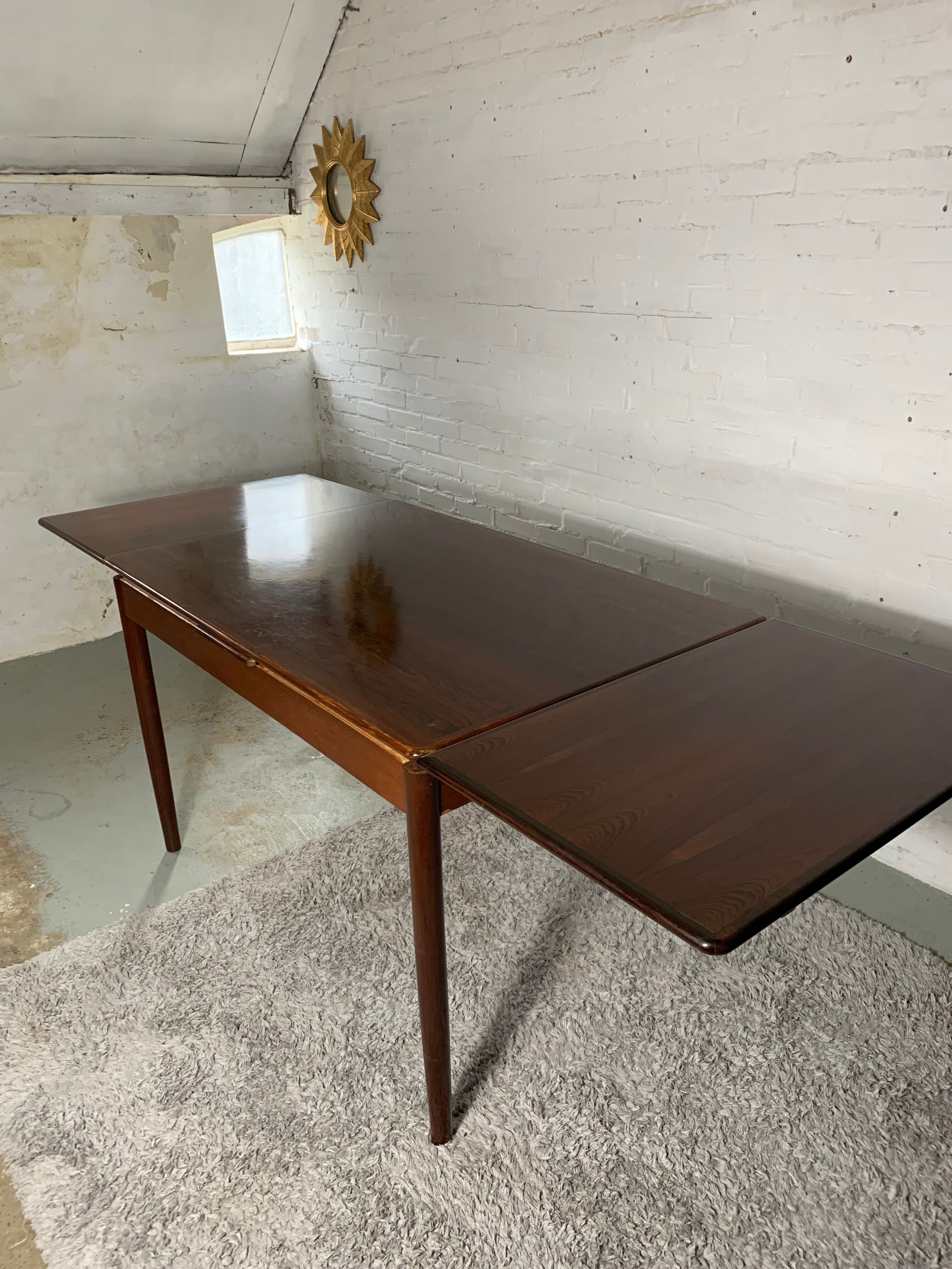 Danish rosewood dining table with extensions, 1960s