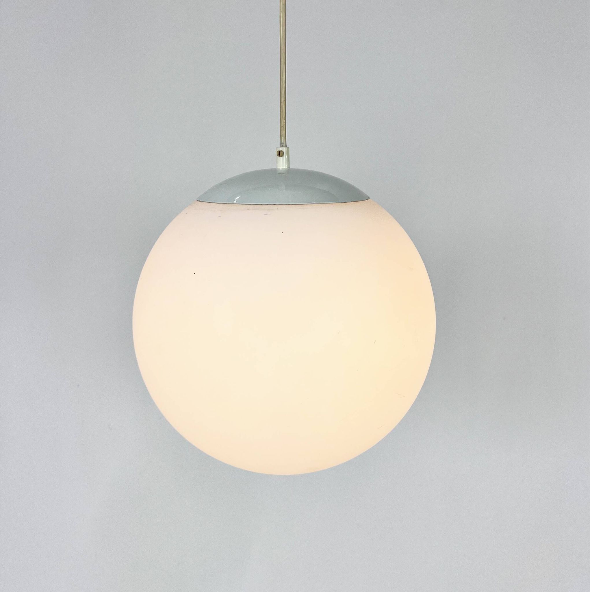 Vintage glass hanging ball lamp by hala zeist, 1960s