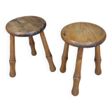 Pair of solid wood tripod stools with turned legs, 60s France