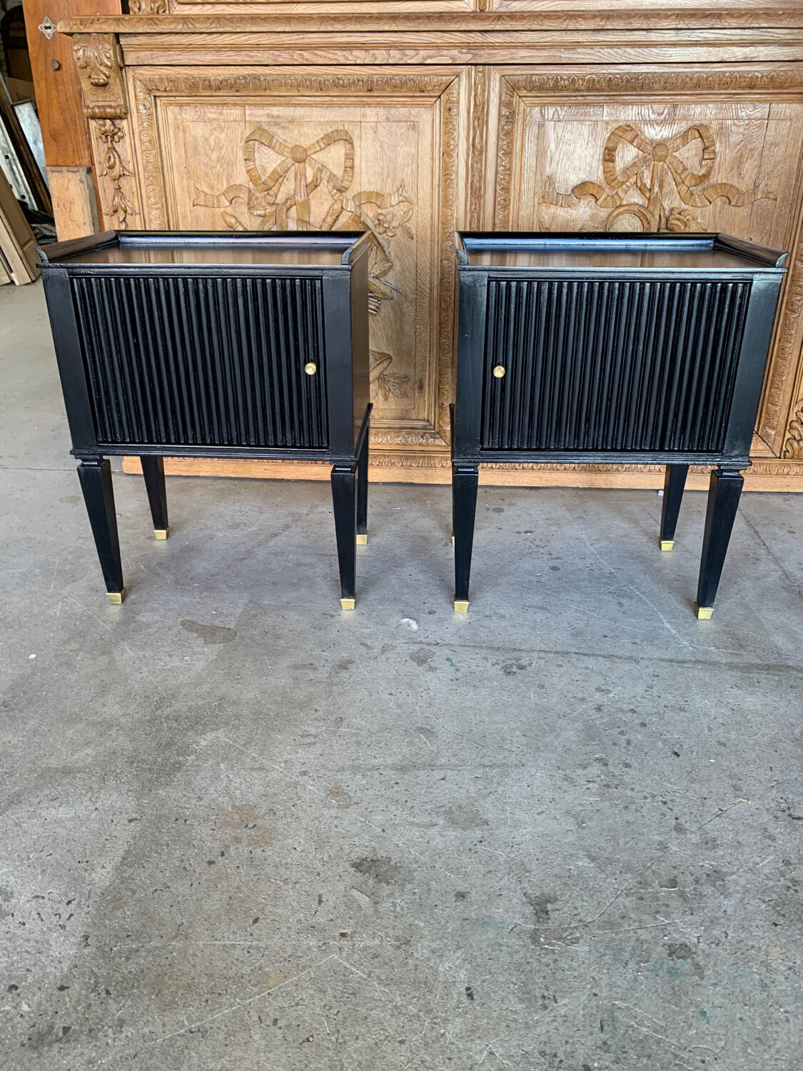 pair of art deco bedside tables in black lacquered mahogany
