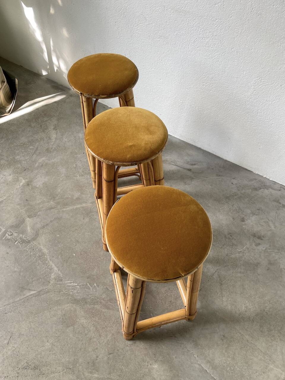 Set of three rattan high stools