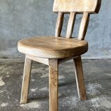 Small child's chair in natural blond teak back with three bars