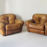 Pair of brown leather armchairs