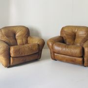 Pair of brown leather armchairs