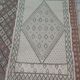 Traditional white and green carpet handmade in pure wool