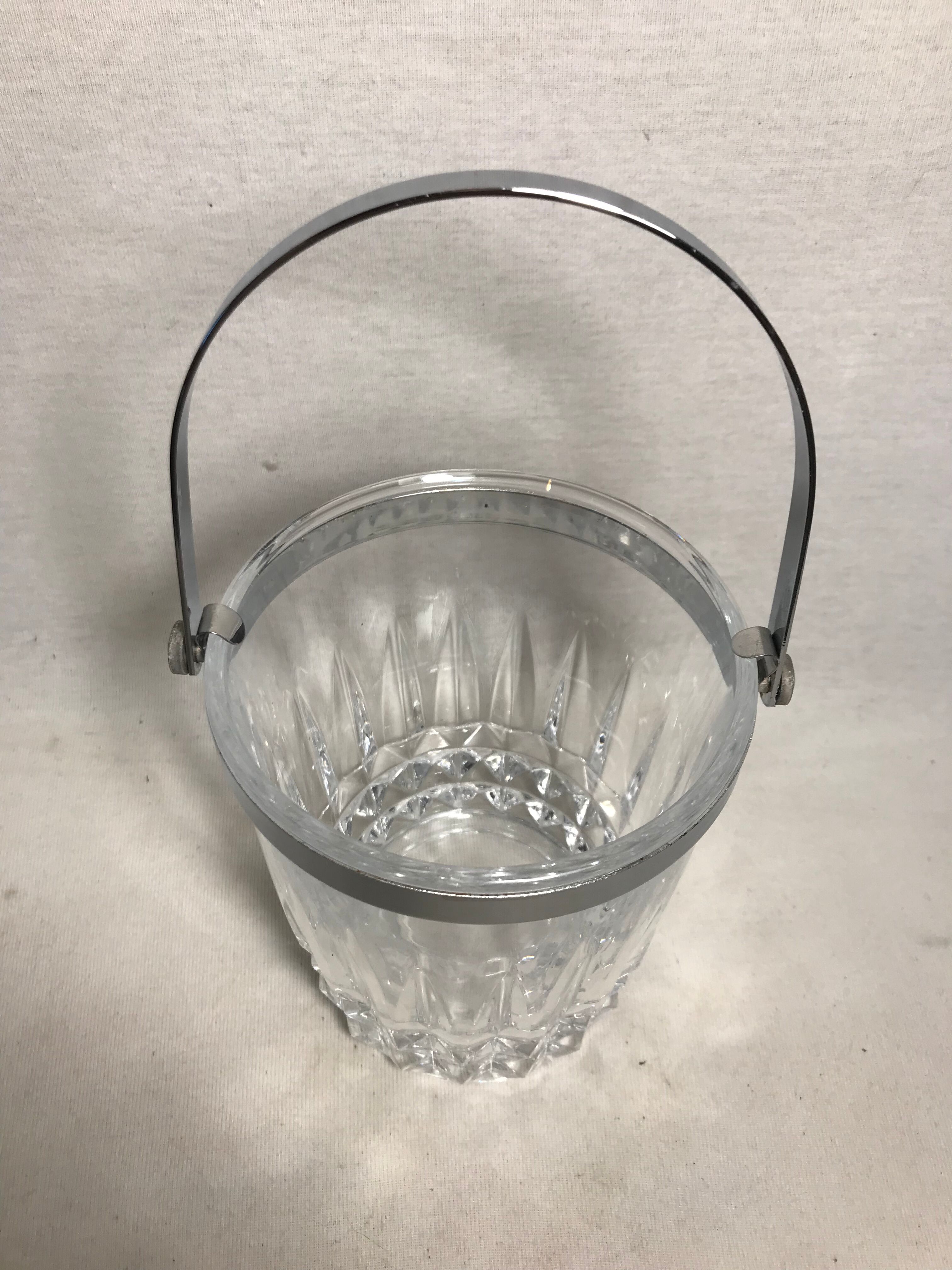 Old arched crystal ice bucket with chrome metal handle