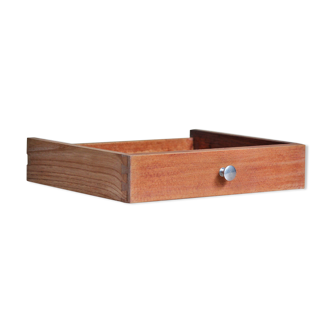 Light wooden drawer with aluminum button