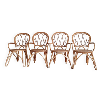 Série de 4 chaisesen bambou courbé assise cannage