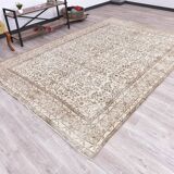 Tapis vintage à motifs floraux beige et marron