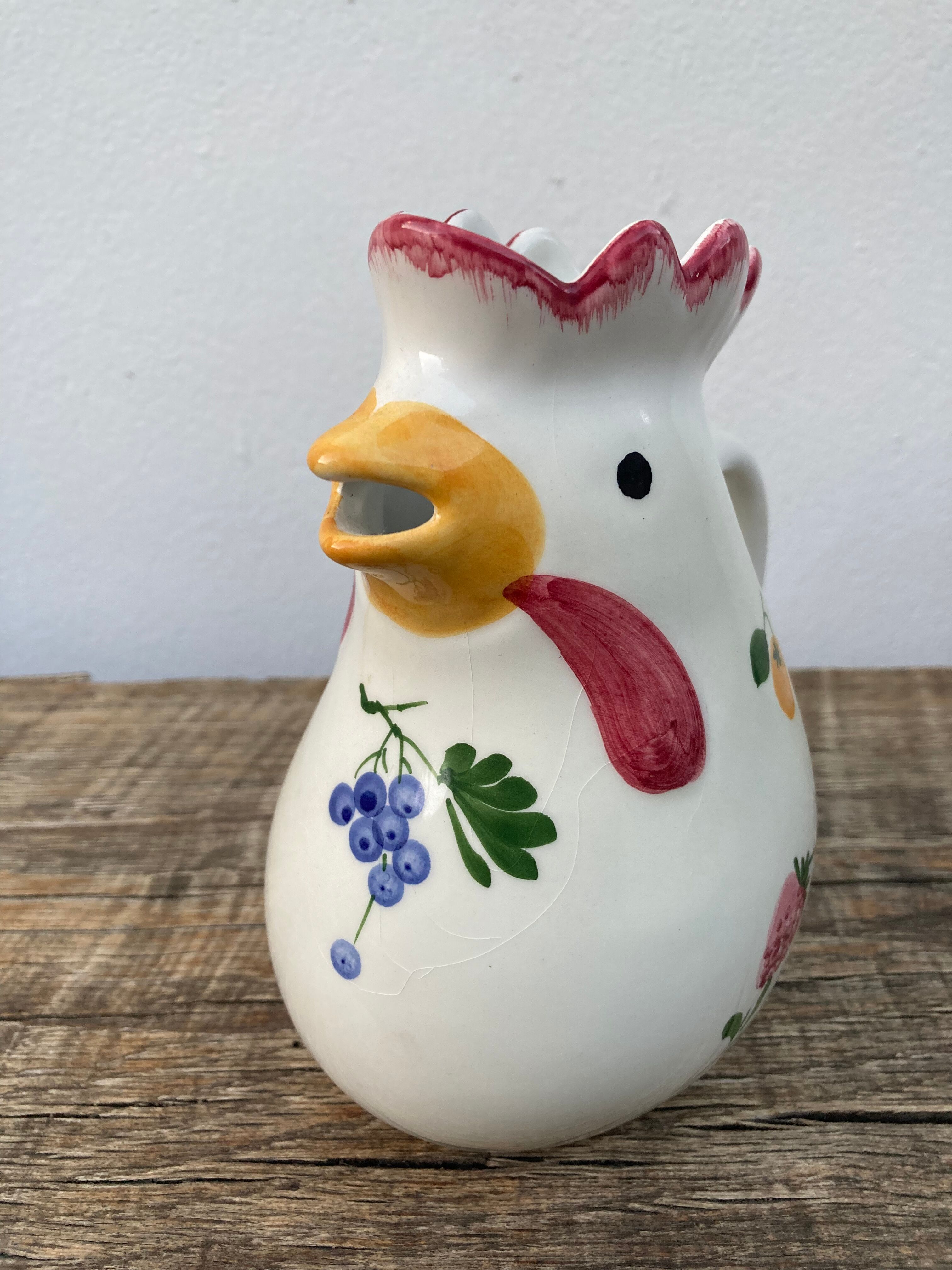 Ceramic rooster pitcher decorated with vintage flowers