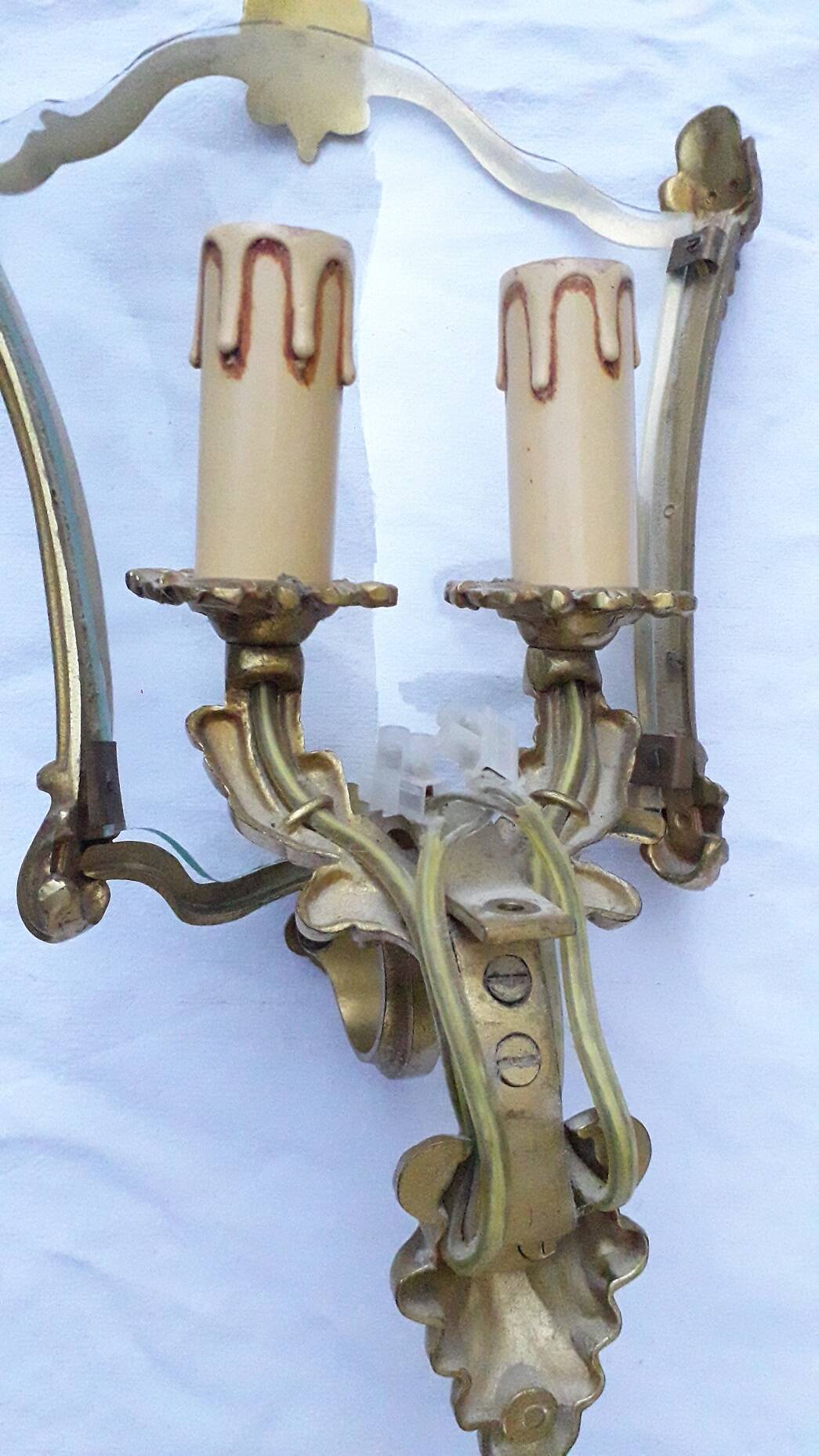 Pair of bronze and glass wall lights