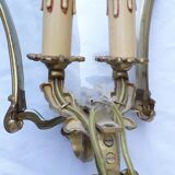 Pair of bronze and glass wall lights