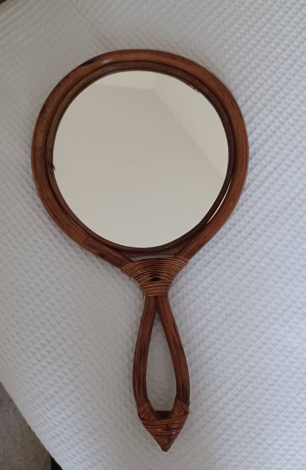 Vintage rattan hand mirror