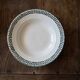 Set of 12 green patterned soup plates, Badonviller earthenware