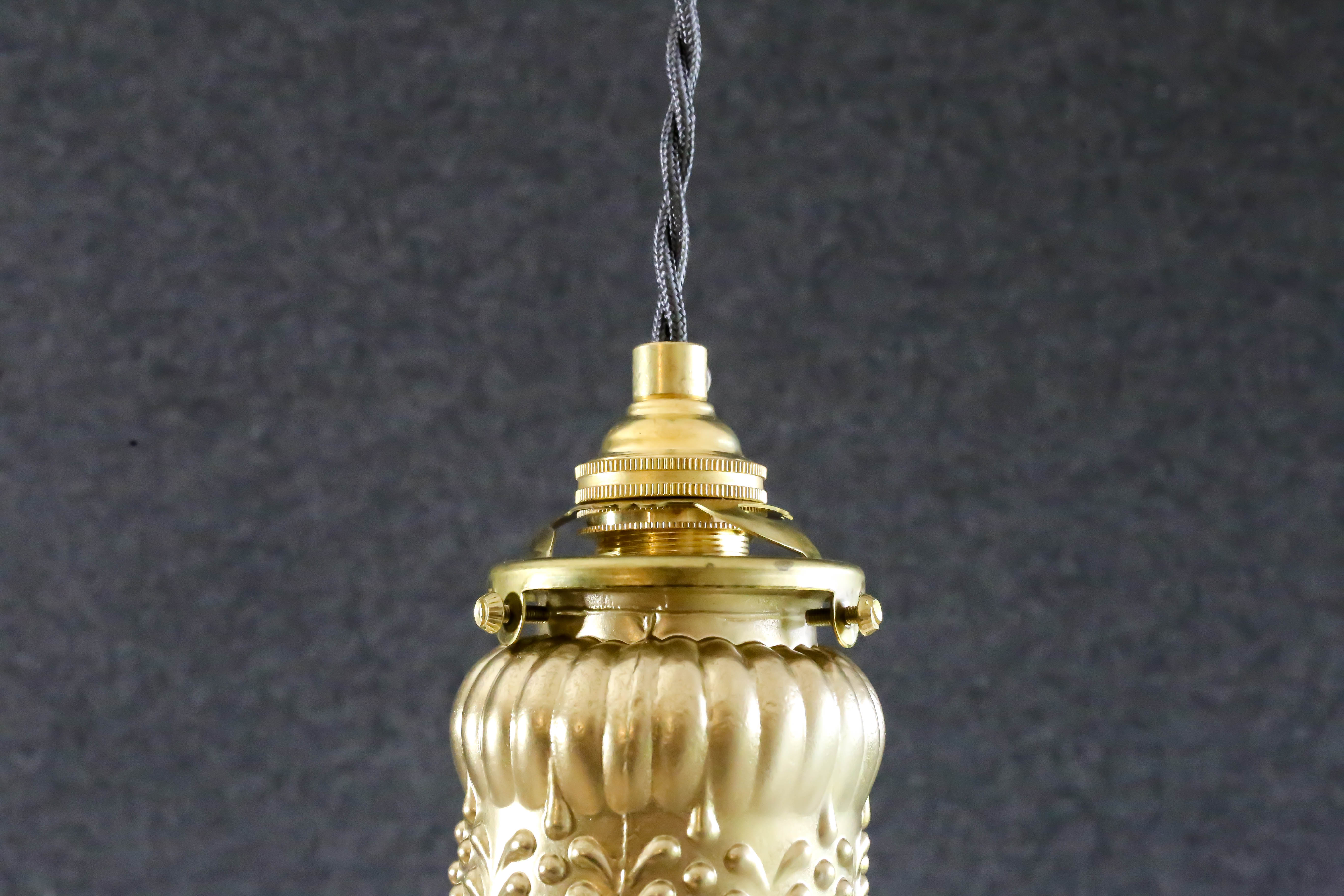 Old tulip suspension painted gold with new brass