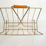 Mid-century openwork magazine rack, in gold metal & wooden handle.