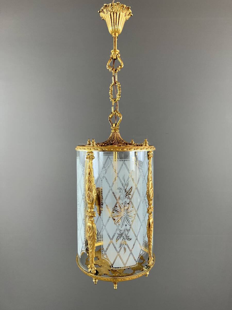 Louis XVI style lantern in gilded bronze and engraved glass, 20th century.