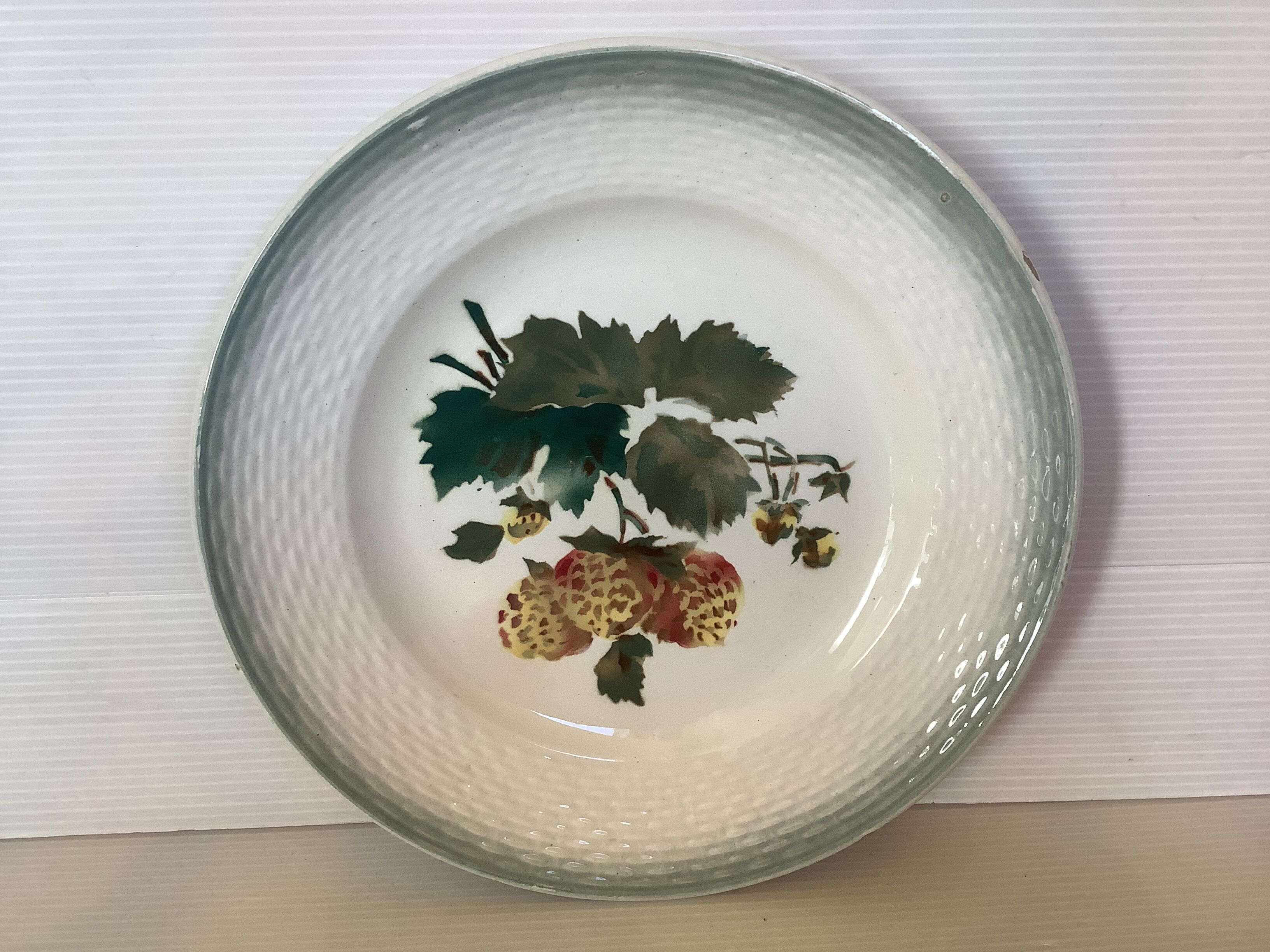 Pair of antique Saint Amand fruit plates.
