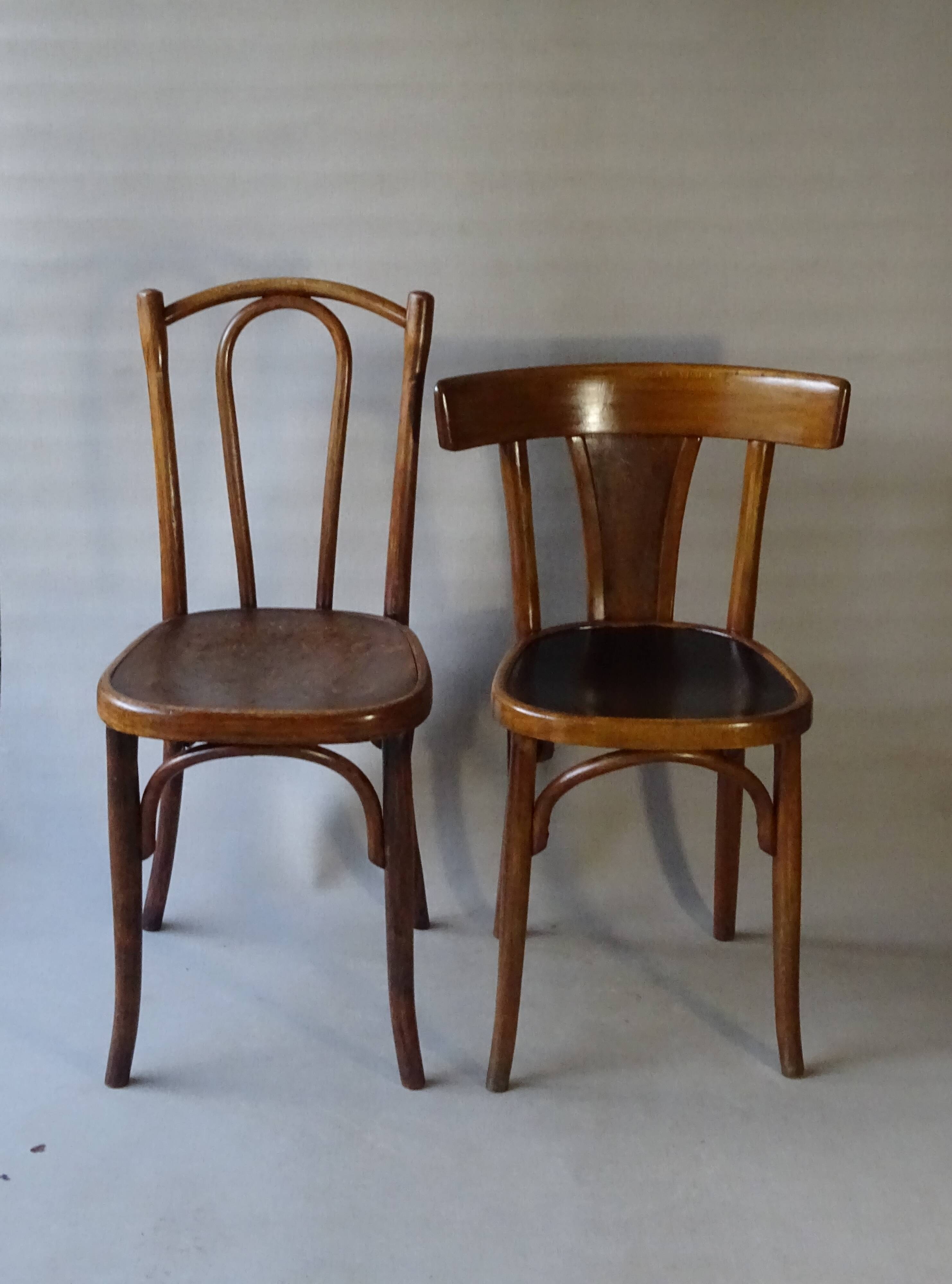 Set of 36 mismatched Bistrot chairs, 1920 to 1950, wooden seats.