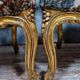 Pair of Louis XV style Baroque armchairs in gilded and carved wood circa 1900