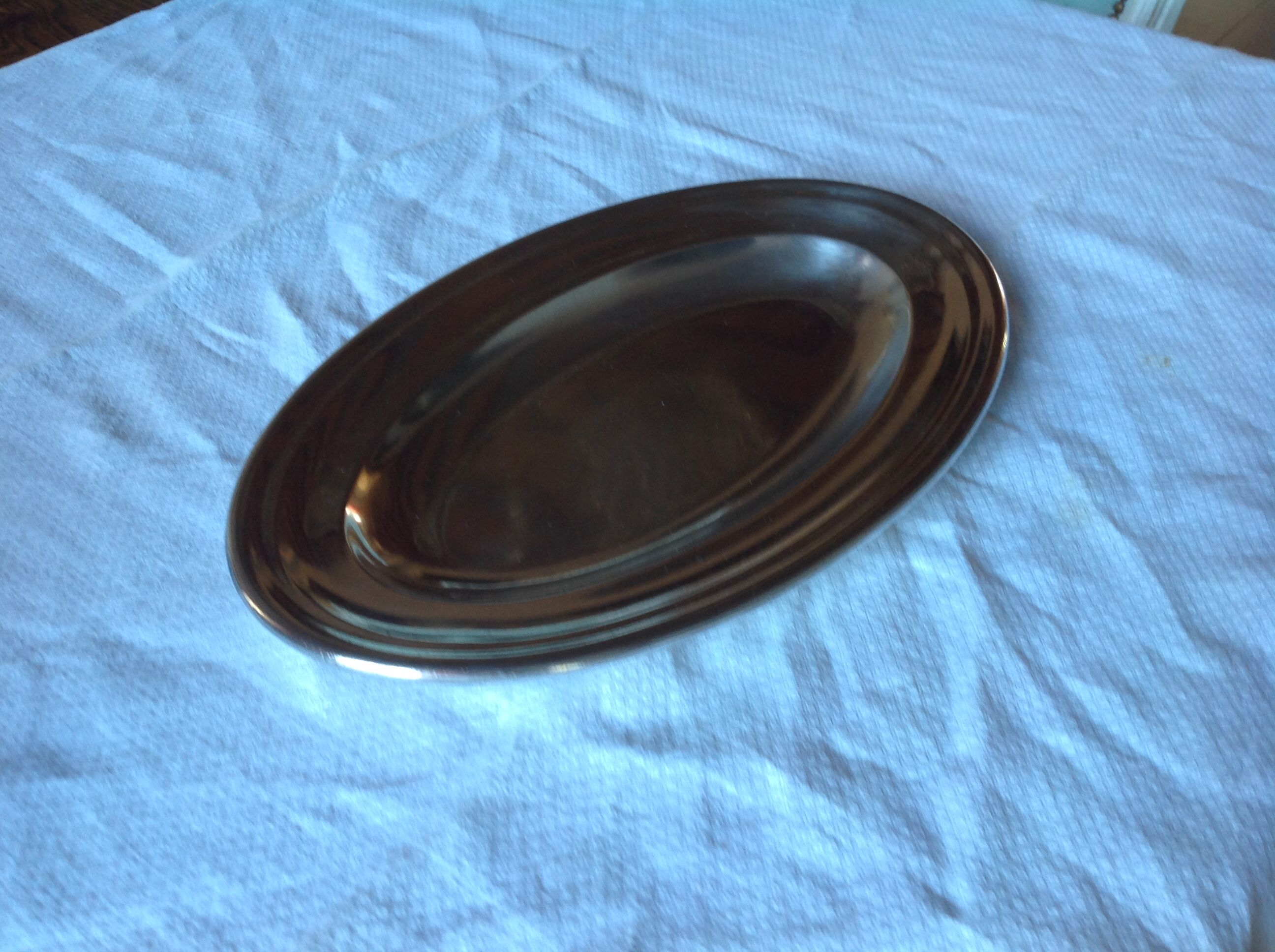 Old oval dish in silver metal