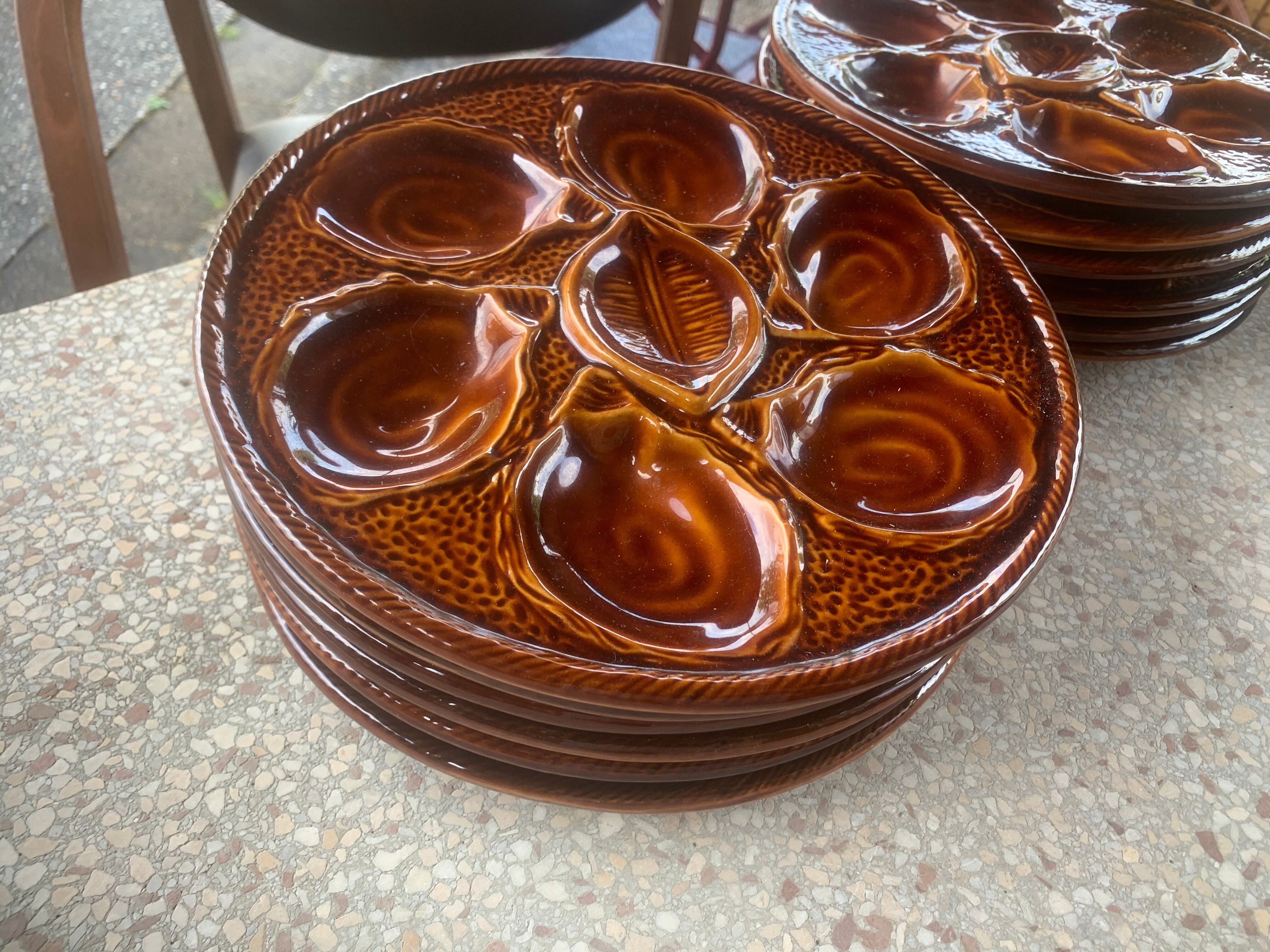 Series of 12 oyster plates St Clement