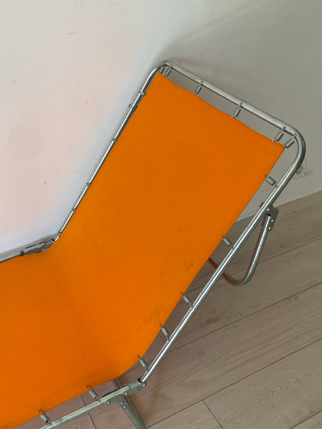 Orange and metal deckchair 1970