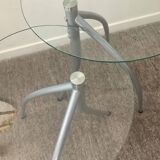 Duo of designer nesting tables with tripod base