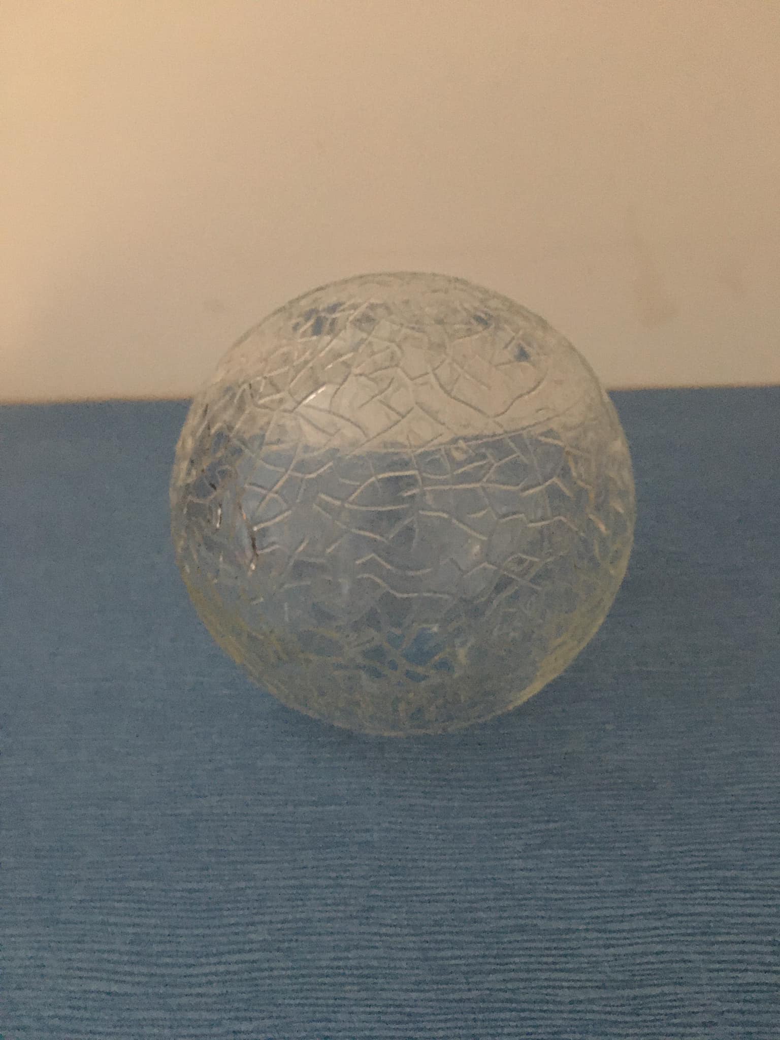 Round globe made of cracked glass