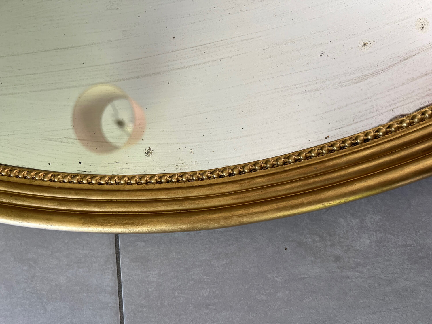 Vintage oval gold mirror