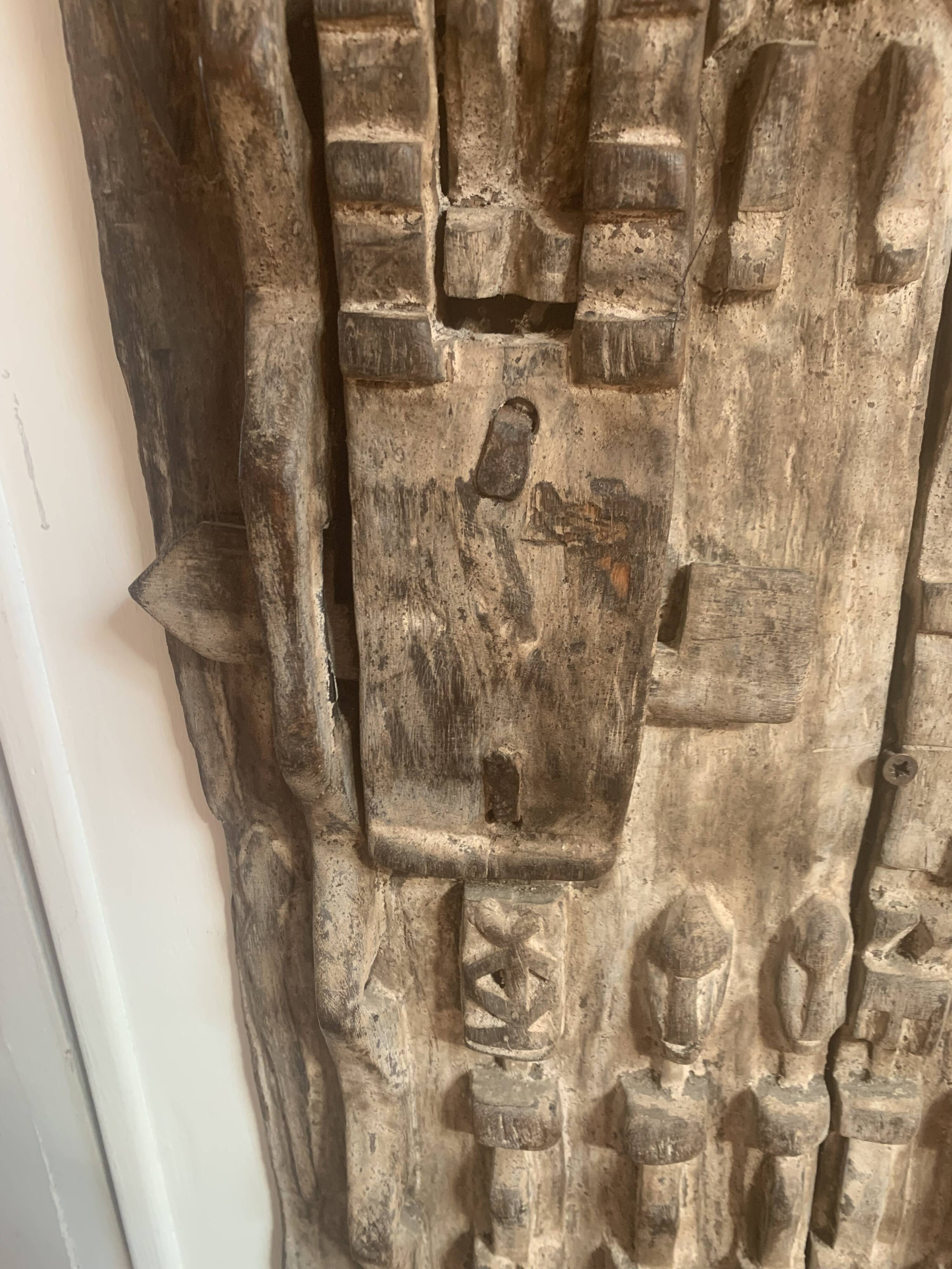 Old carved African door in solid wood – ethnic decoration – pi