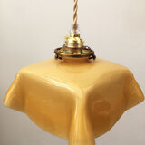 Suspension in pale yellow opaline