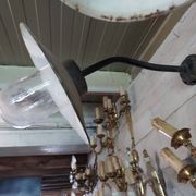 industrial wall light in the shape of a swan neck