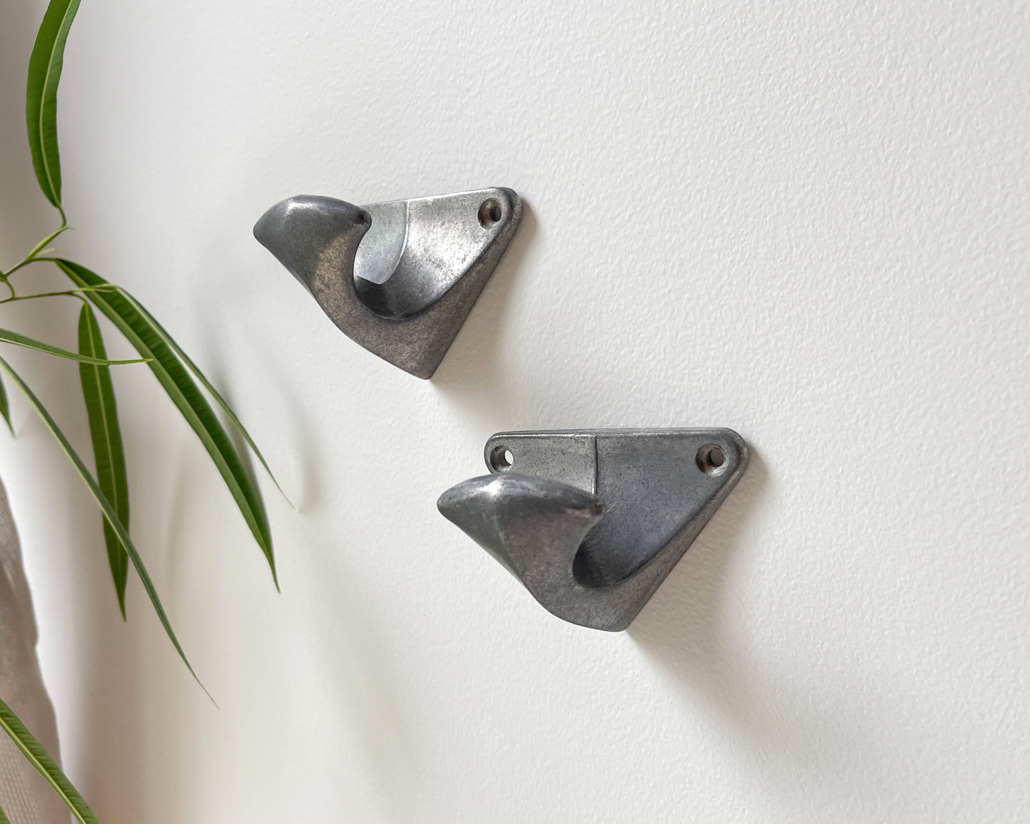 Vintage cast aluminum wall hooks