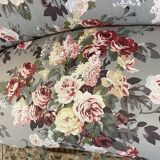 Napoleon III sofa upholstered in a floral patterned fabric